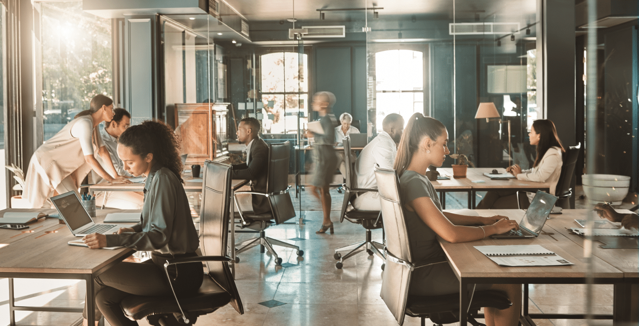 Modern office team working together – employee benefits and group health insurance Nebraska | CRS Group