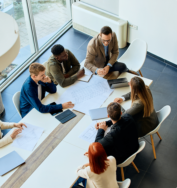 Group of professionals in a meeting discussing personal lines insurance coverage – CRS Group Nebraska