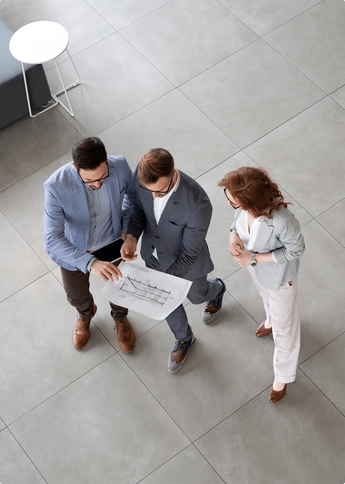 Business team reviewing commercial insurance documents – why coverage matters | CRS Group Nebraska