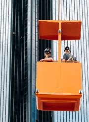 Workers on a construction lift – builder's risk insurance Nebraska | CRS Group
